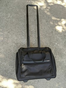 briefcase with wheels and handle