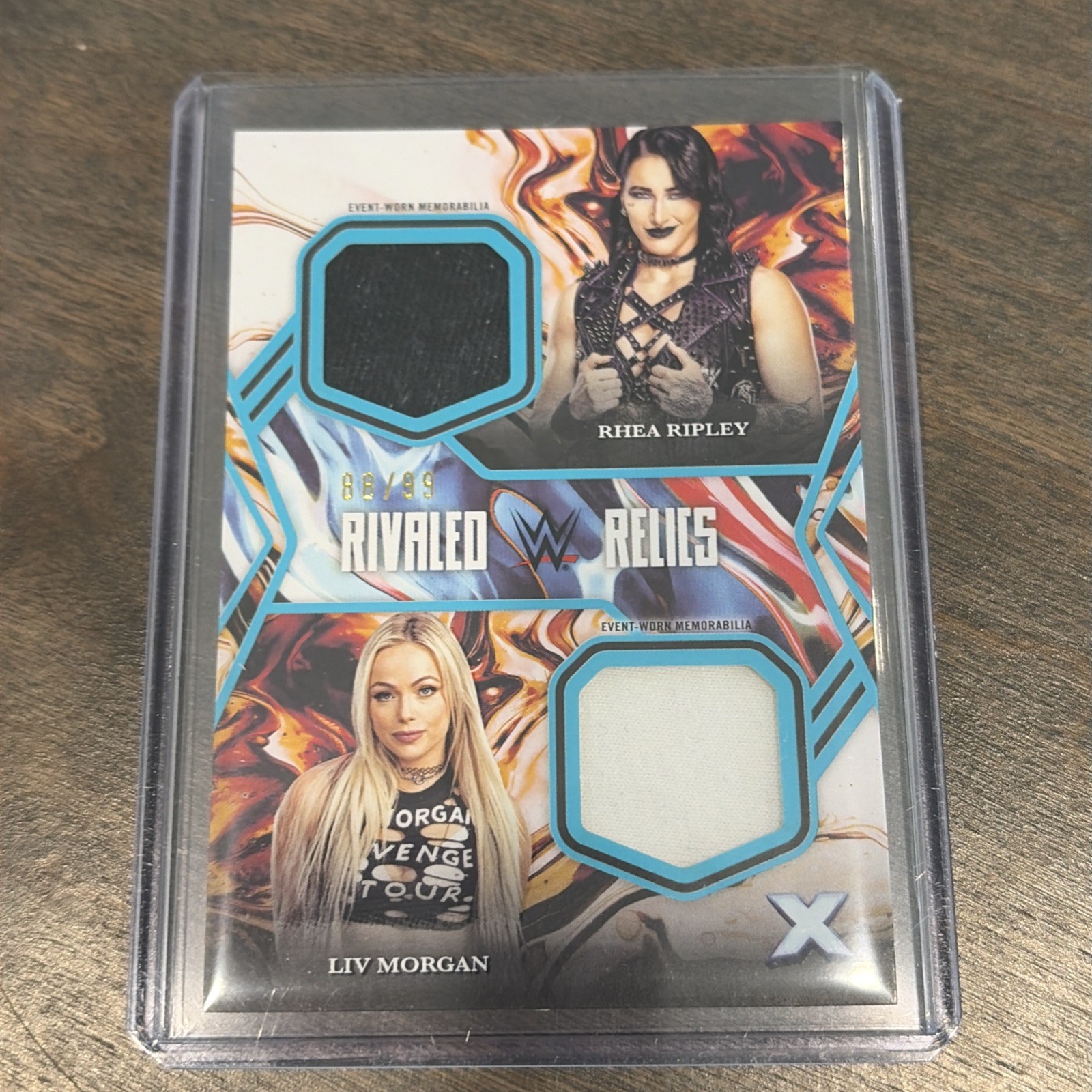 Rhea Ripley & Liv Morgan WWE 2025 Topps Exalted Rivaled Relics 88/99 view 1