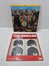 Lot 2 The Beatles Vinyl Record Albums Lp A Hard Days Night & Sgt Peppers Lonely
