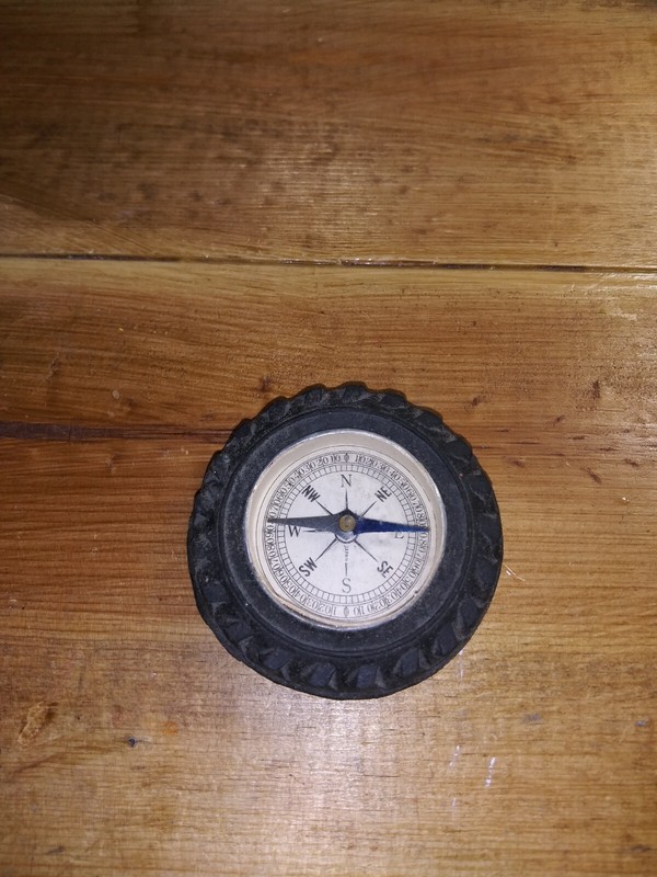 Vintage rubber tractor tire shaped pocket size compass