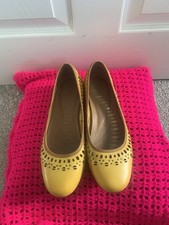 Beautiful Clarks Saffron Yellow Leather Slip On Shoes.