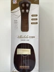 Toy Ukulele For Children Or Display Plastic Sealed Box