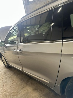 Used Rear Left Door Assembly Rear Side fits: 2017 Chrysler Pacifica movable glas