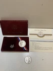 Lot of 1879 Morgan Silver Dollar & 1984 Olympic Silver Coin .77 troy oz 900 Fine