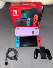 Nintendo Switch Console Neon Blue/Red. Comes with case, controller holder hdmi