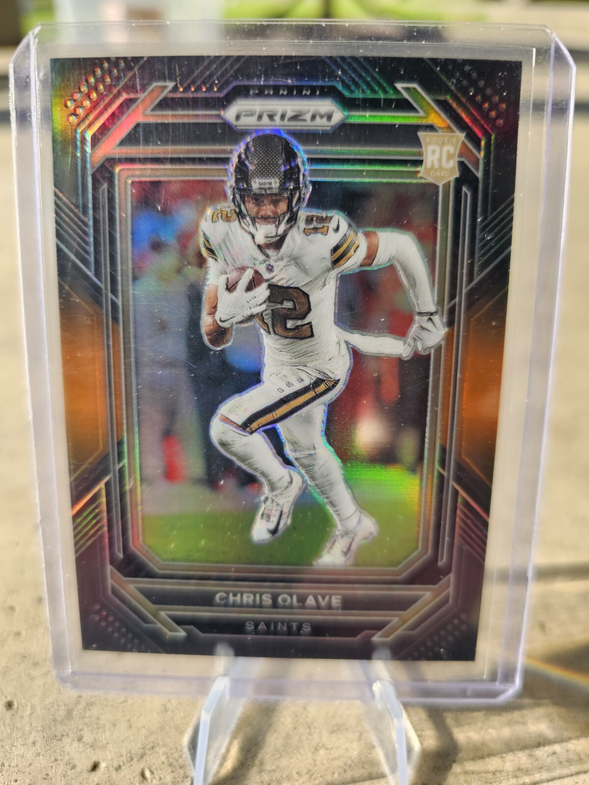 2022 Panini Chronicles Chris Olave RC Prizm Black Orange /75 Saints Rookie 🔥