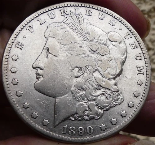 REDUCED!! BETTER DATE 1890-CC MORGAN SILVER DOLLAR TAIL BAR VF