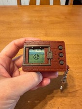 1997 Bandai Digimon Virtual Pet Brown Keychain Toy   Tested  Working