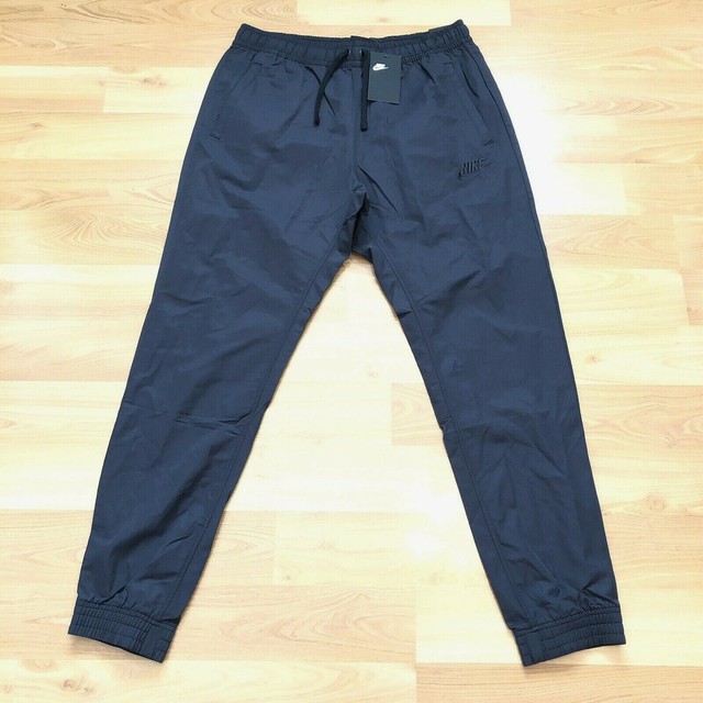 nike standard fit tapered leg pants