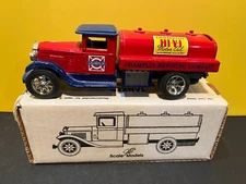 1/34 JLE 1929 INTERNATIONAL TANKER CHAMPLIN MOTOR OIL BANK RED AND BLUE