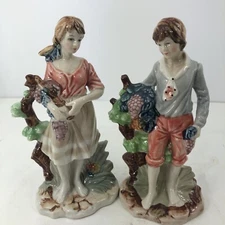 Artmark Figurines Girl/Boy/Grapes Ceramic   7 1/2” Tall. Base 3 3/4”x3”VTG