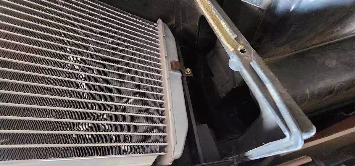 The new heater core positioned inside the HVAC box.