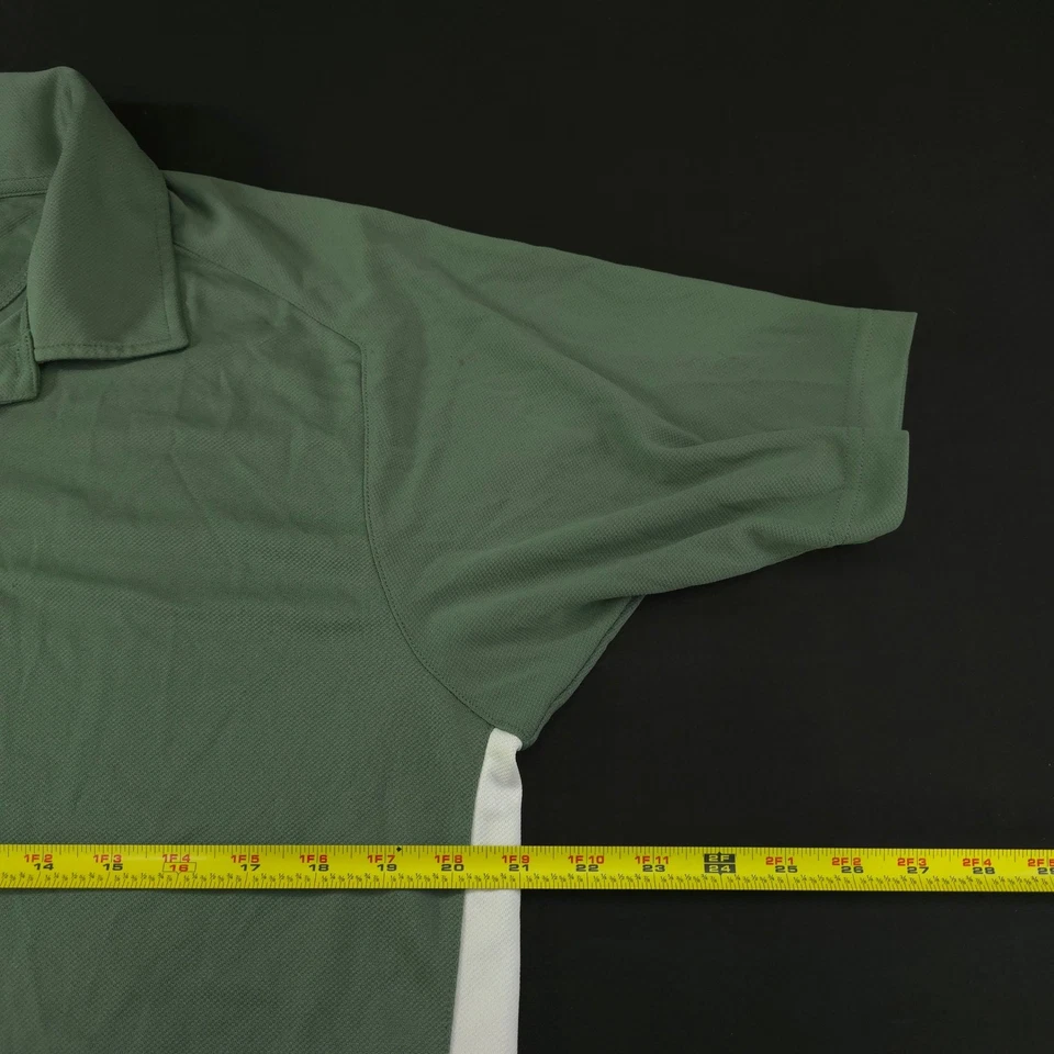 Polo de golf Zero Restriction Tour Series para hombre verde medio rendimiento sólido Foto 4 de 4