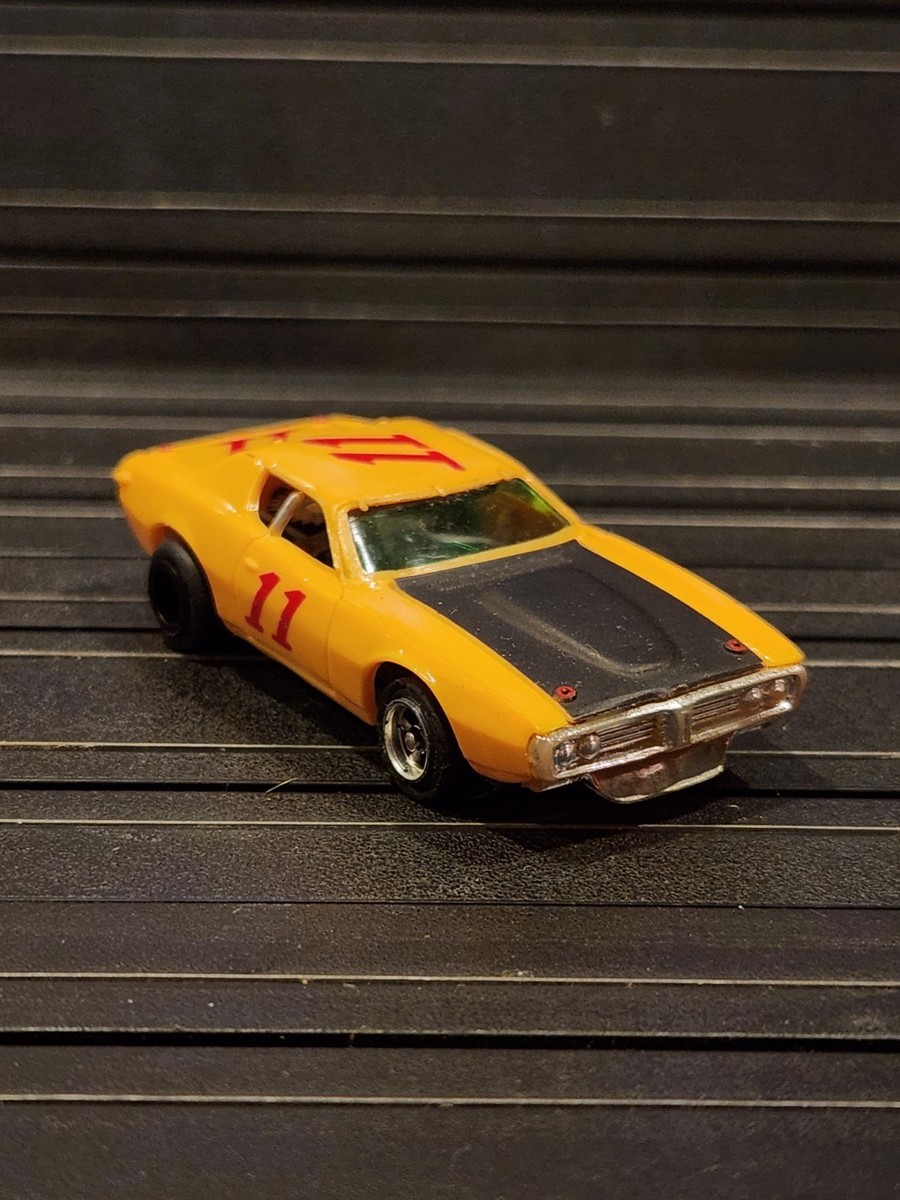 Aurora AFX HO Scale Slot Car #11 Dodge Charger Stock Car Yellow