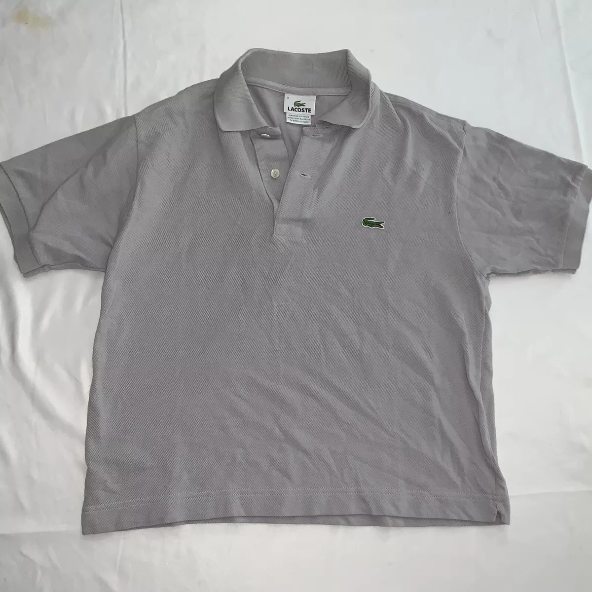 Lacoste polo top size 3