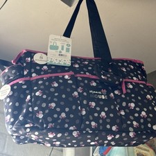 Disney Minnie Mouse Multi Piece Diaper Bag set with Minnie Mouse Toss Heads Prin