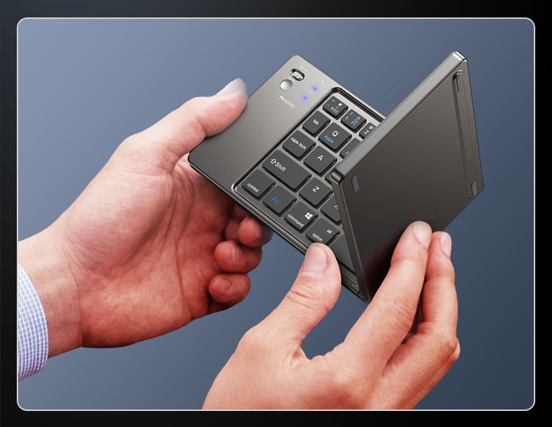 Clavier Bluetooth pliable à 65 touches gris pour PC, Mac et smartphones Android ou iOS