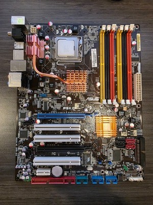 ASUS P5KC Rev 1.03G LGA 775 ATX Motherboard & Intel Core 2 Quad Q9300