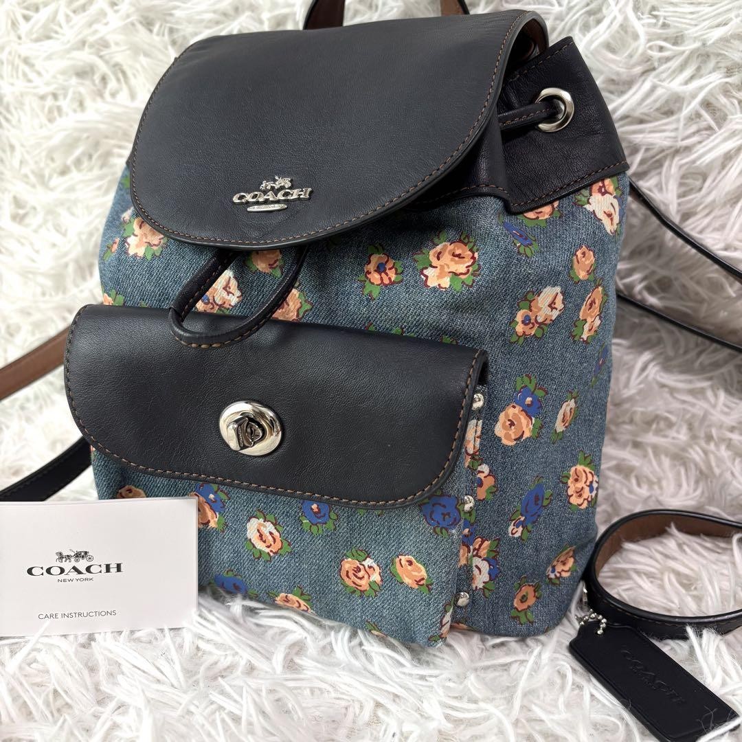 Coach Floral Print Denim Backpack with Turnlock Closure