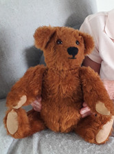 Vintage German? 14in jointed brown teddy bear. Wood shaving? hard stuffed