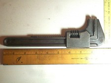 Hand tool WRENCH MONKEY 9 INCH LONG UNBRANDED WITH A  7  VERY CLEAN