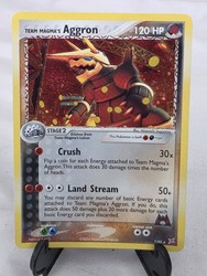 Team Magma's Aggron 7/95 EX Team Magma vs Team Aqua Holo Rare