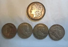 3 1961 Franklin Half Dollars, 1 1964 Kennedy, 1 1899 Morgan 90% Silver