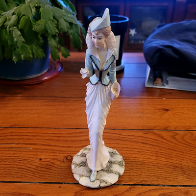Lesser & Pavey Ltd Woman Figurine White Dress Blue Jacket People Theme 9.5 in