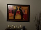 A soulful sax player stands beneath a haze of golden light, lost in the music. — photo 3