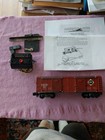 American Flyer S Gauge 974 Brown Erie Action Box car with crates, etc. — photo 1