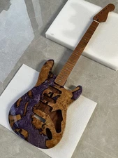 mahogany electric guitar body is surface with an epoxy resin luster neck A set