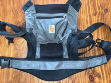 Gray ergo baby carrier with infant insert