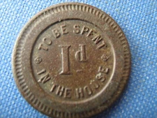 1d TO BE SPENT IN THE HOUSE TOKEN NUMBERED 150, ( about the size of a sixpence)