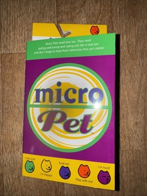Collectible Micro pet electronic digital pet  ''red'' New