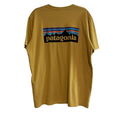 Patagonia Spell Out Graphic Tee T-shirt Size XL Mens Gold Short Sleeve Crew Neck