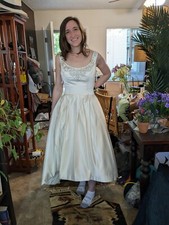 New Oleg Cassini wedding dress size 10 with tags from David's Bridal.  Pockets.