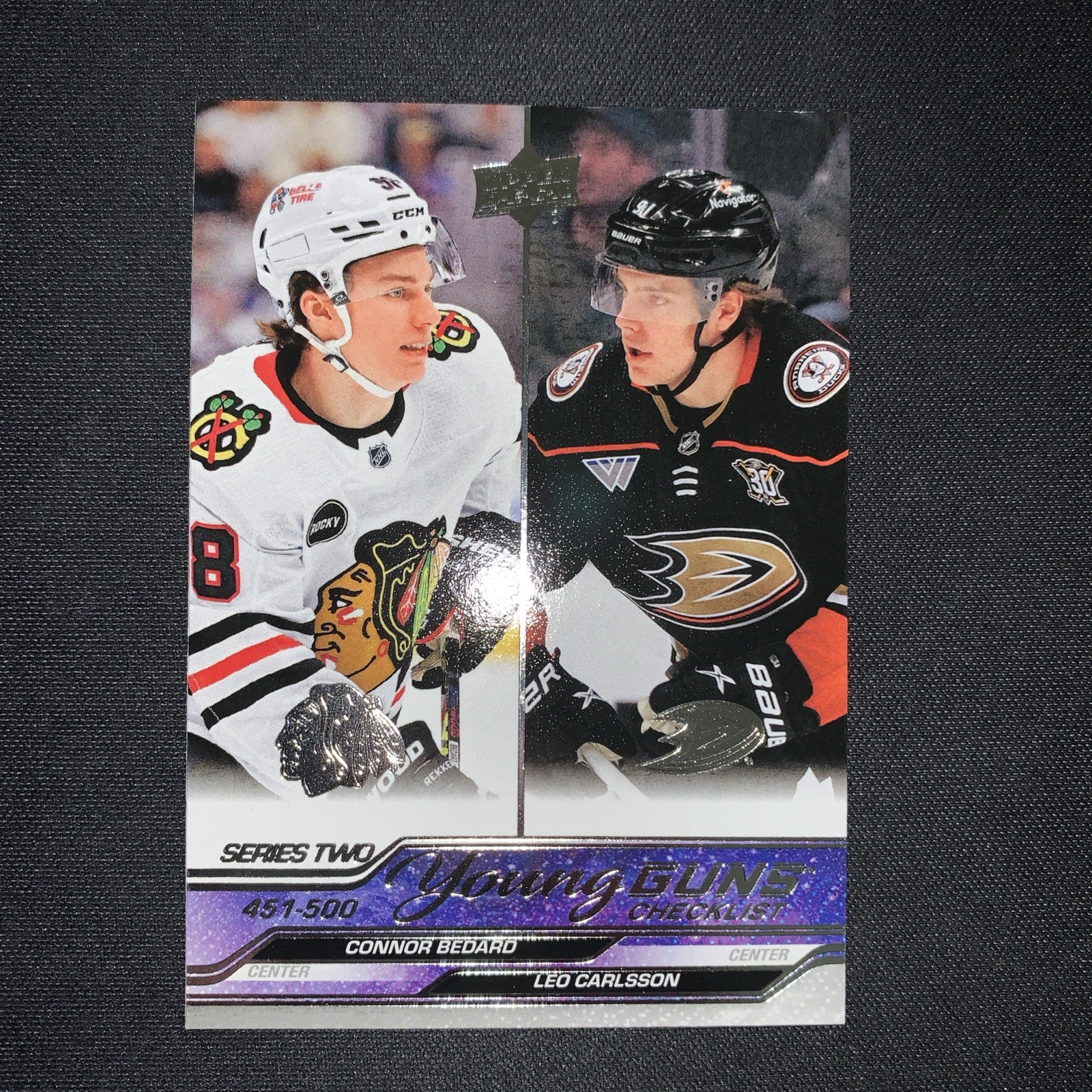 2023-24 Upper Deck Series 2 - Young Guns Checklist Connor Bedard Leo Carlsson view 1