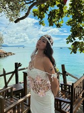 Hand-Crocheted Floral Mesh Hat with Side Ribbon Bows