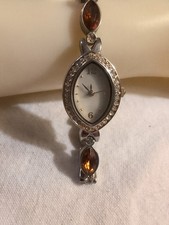 Christian Benet silver-tone women's wristwatch with orange and clear...