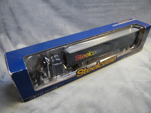 1/64 SCALE SPECCAST STEELCASE PETERBUILT MODEL 379 NAVY SEMI W/53' TRAILER-MIB - Picture 13 of 14