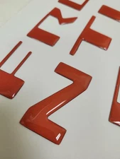 LAVA RED letters fits NISSAN FRONTIER 2022 23 logo front hood grille insert