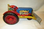 LARGE VINTAGE MARX PRESSED STEEL LITHO. TRACTOR WITH (5)  IMPLEMENTS