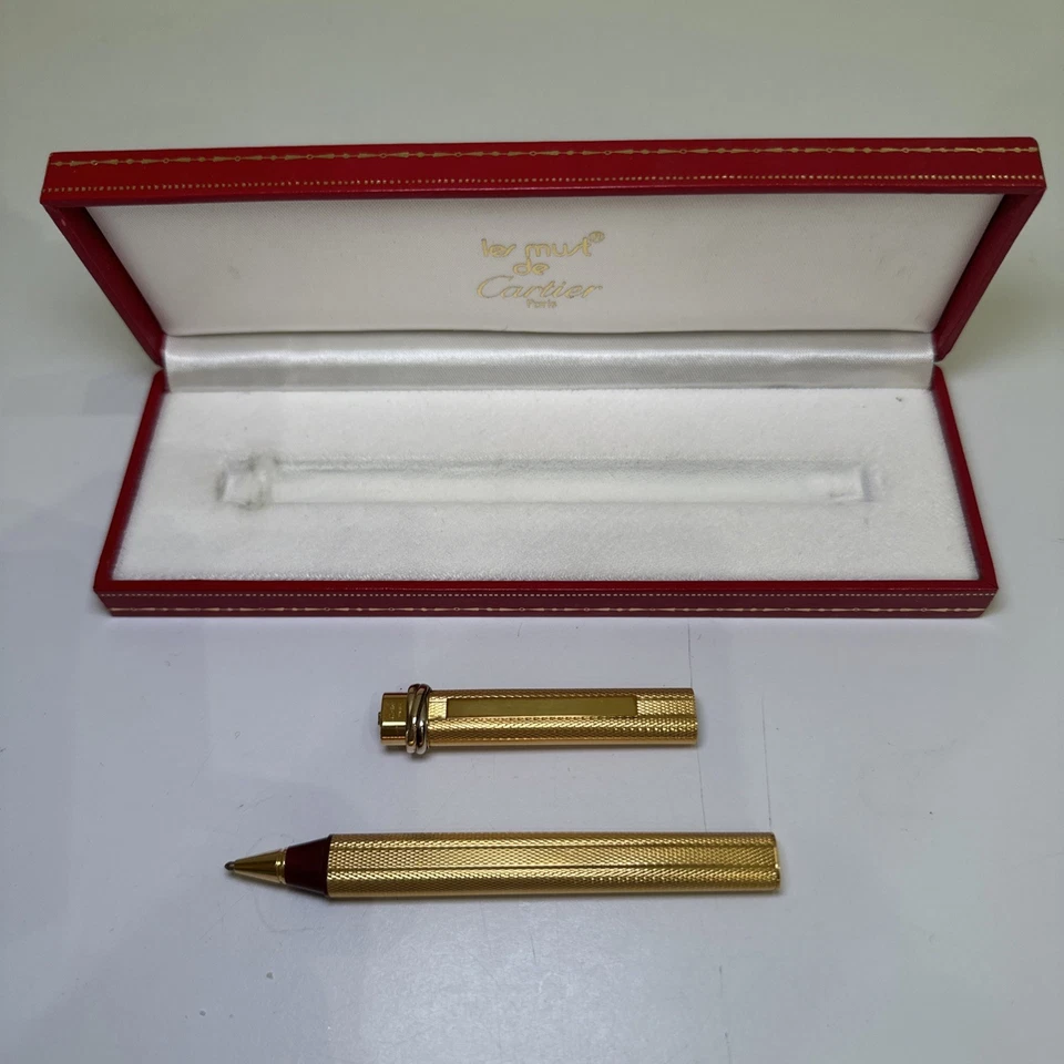 Auténtico bolígrafo Cartier Must de Cartier Trinity Vendome oro 3 anillos con caja Foto 2 de 4