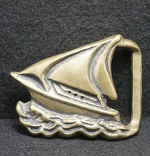 WG09145 NOS VINTAGE 1970s CUT-OUT SAILBOAT SHIP ARTWORK BRASS BELT BUCKLE