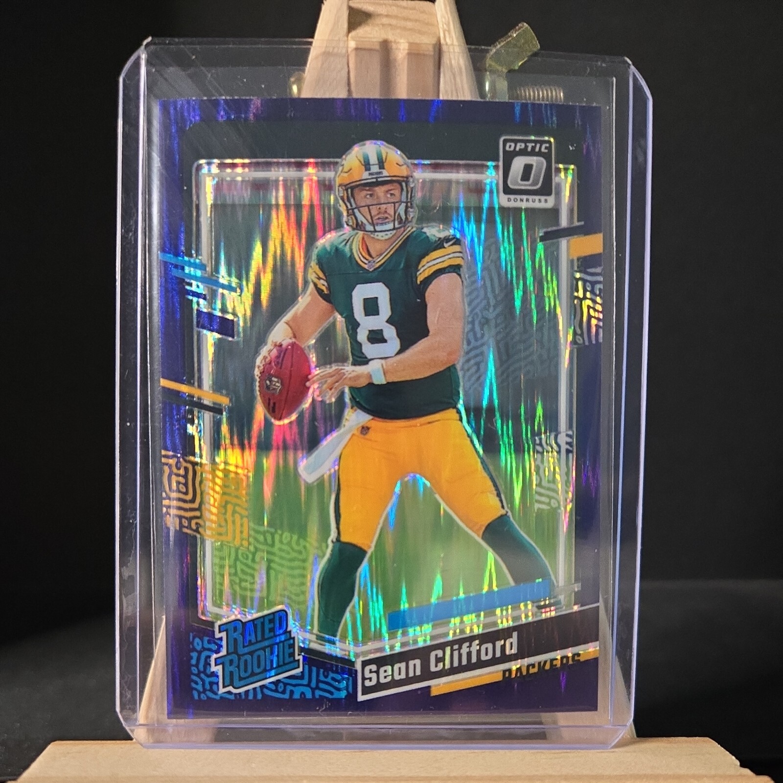 2023 Panini Donruss Optic - Rated Rookie Purple Shock Prizm #242 Sean Clifford