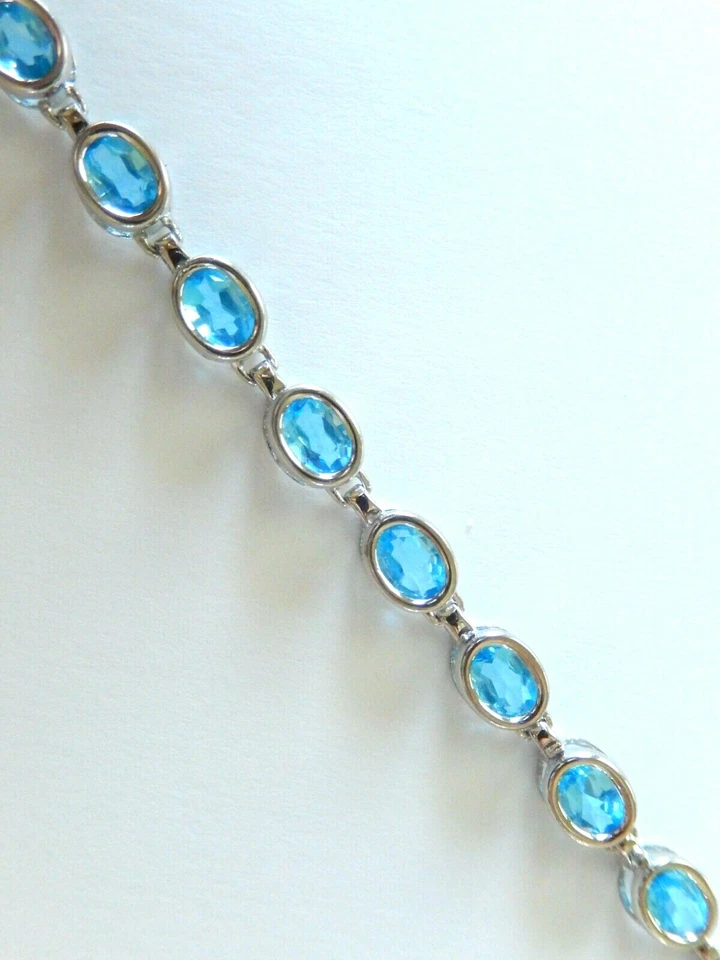 *NUEVO CON ETIQUETAS* BRAZALETE TENIS TOPACIO AZUL OVALADO ORO BLANCO 14K 8,50 CT 7,25" - 8,2 gms Foto 4 de 4