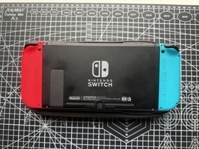 Nintendo Switch Handheld System + 256GB SD Disk & Super Mario Bros. U Deluxe