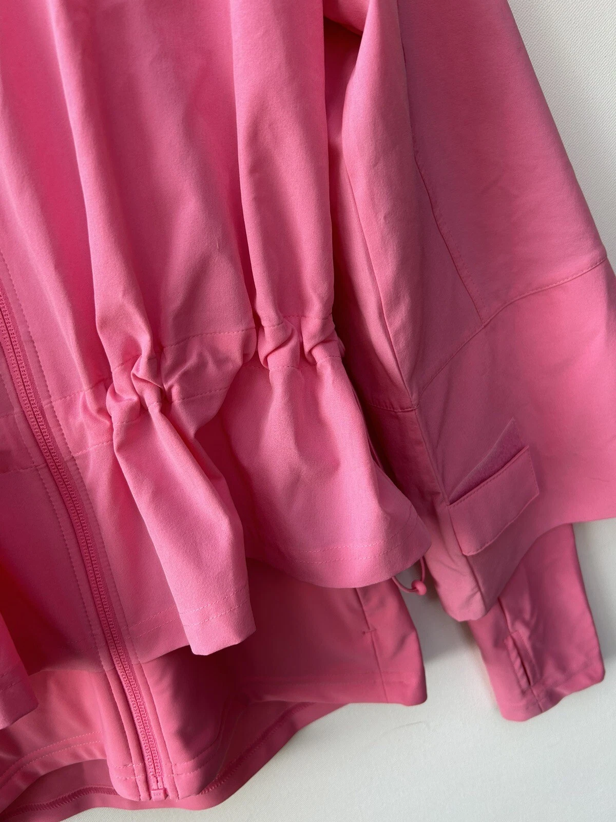 sweaty-betty fast lane windbreaker ruffled zip front workout jacket