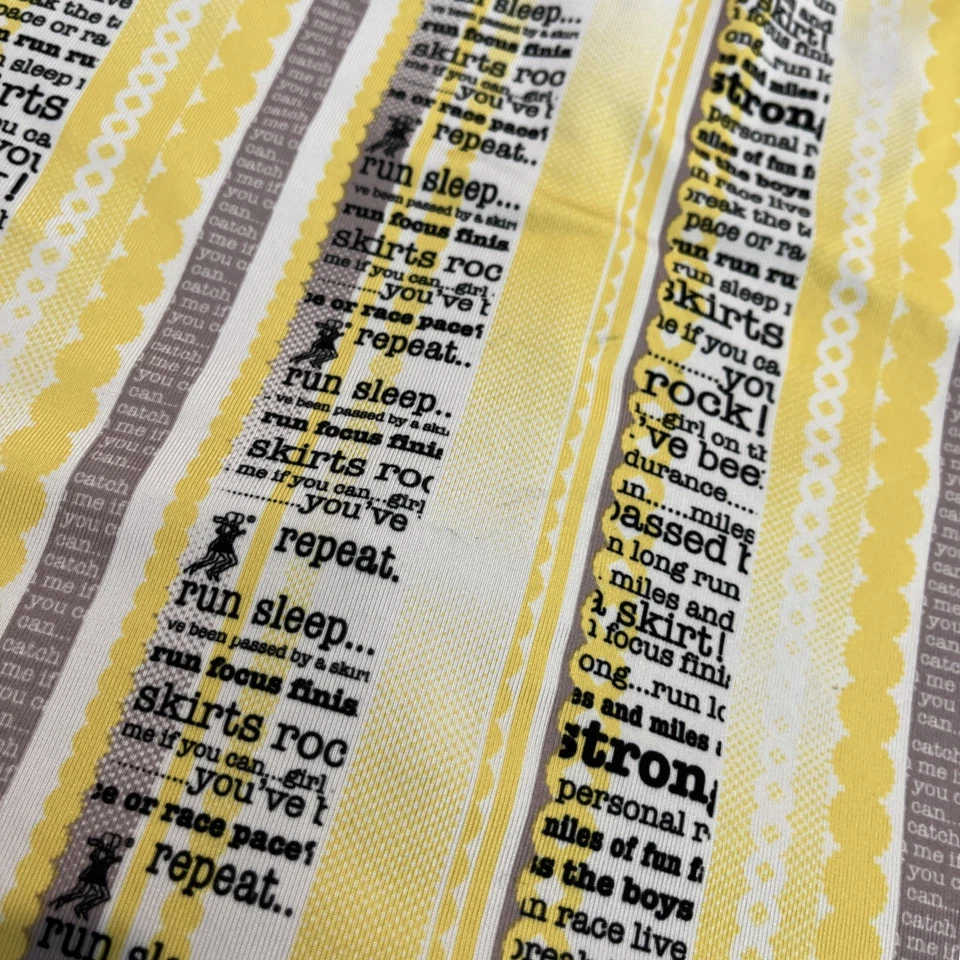 Faldas de running para mujer amarillas con reflejos de escritura bolsillos laterales, talla 2 Foto 4 de 4