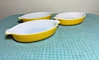 Vintage yellow Pyrex Pixie au gratin casserole dishes - set of 3
